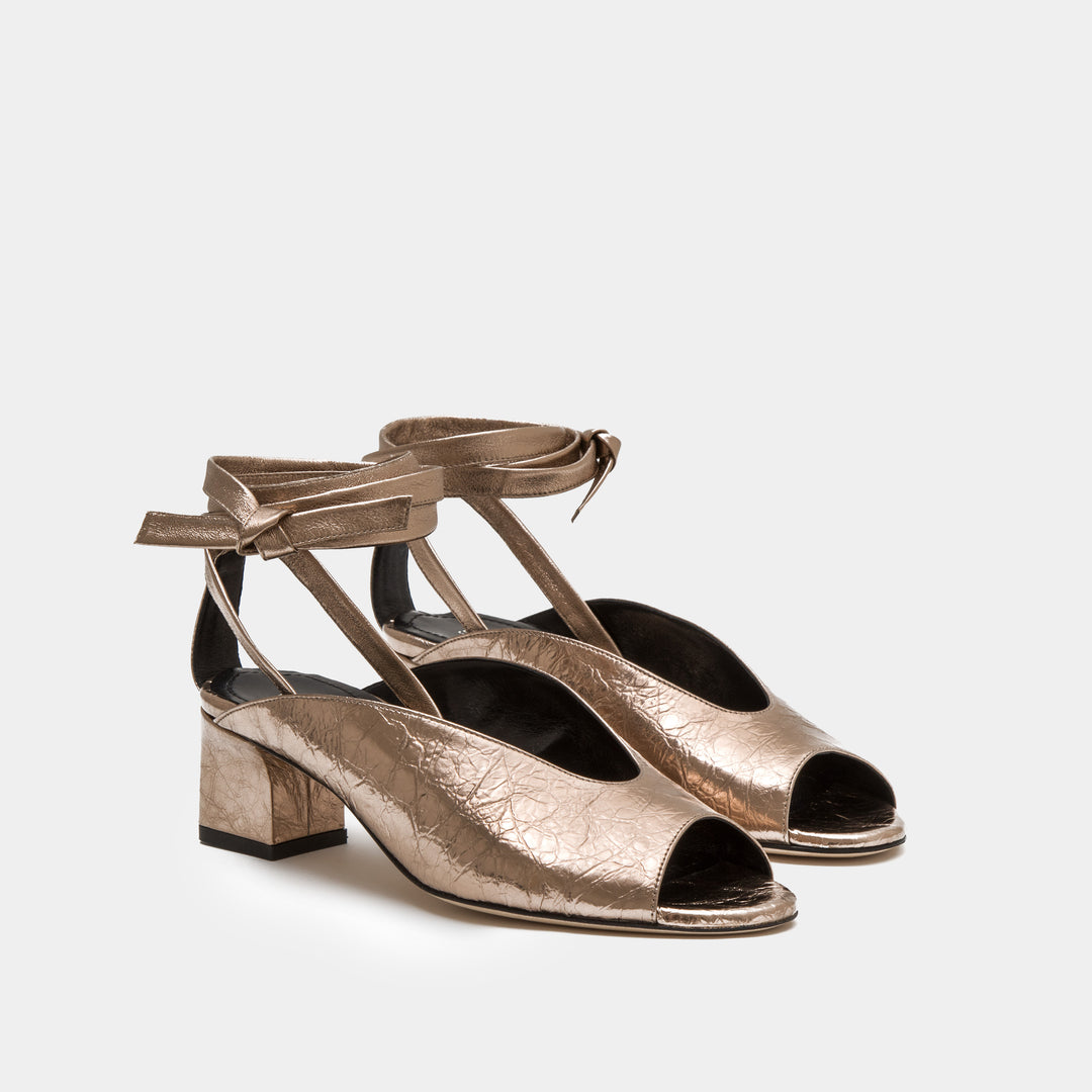 Bronze metallic nappa peep toe mule with an ankle tie wrap block heel