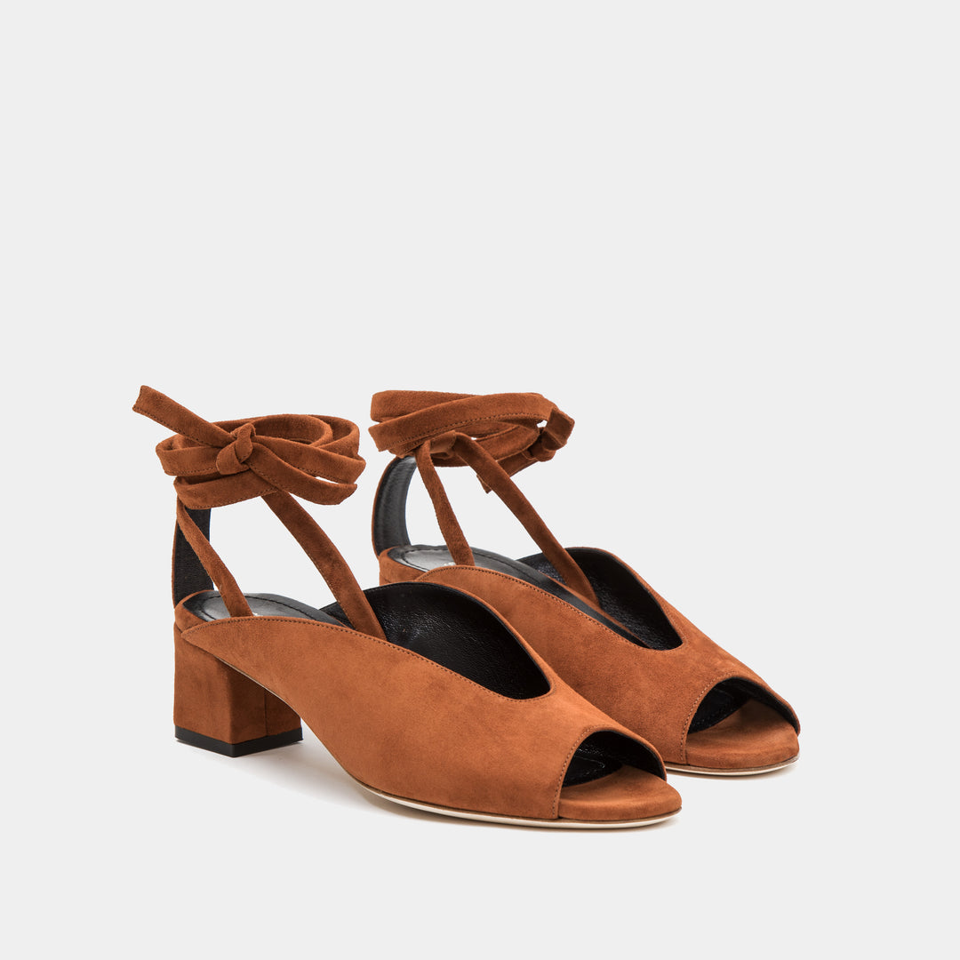 Cognac suede peep toe mule with an ankle tie wrap block heel