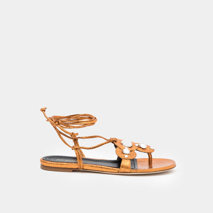 Copper crinkle metallic oversized studded flat thong with an ankle-tie