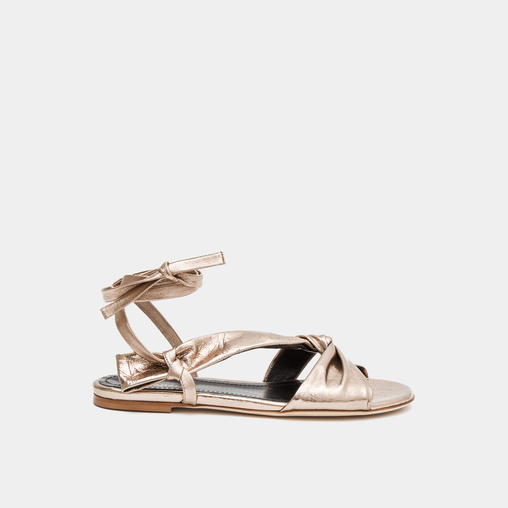 Bronze metallic Knotted nappa flat sandal with an ankle tie wrap
